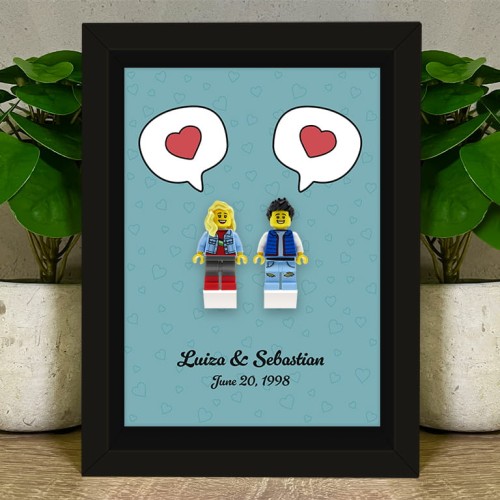 Accéder au produit Couple amoureux – Figurines personnalisées à partir de pièces LEGO® – Cadre (Fond style BD)