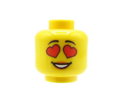 Zum Produkt Minifiguren-Kopf (weiblich, Herzaugen, gelb) – Custom Druck auf LEGO® Kopf