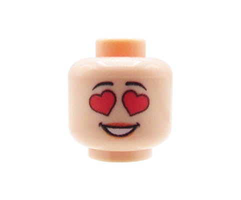 Zum Produkt Minifiguren-Kopf (weiblich, Herzaugen, hautfarben) – Custom Druck auf LEGO® Kopf