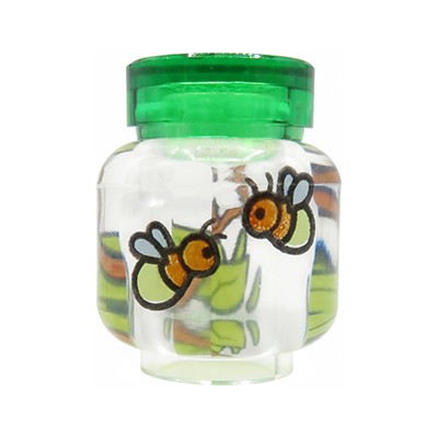 Bocal LEGO® transparent avec couvercle vert et lucioles à l’intérieur