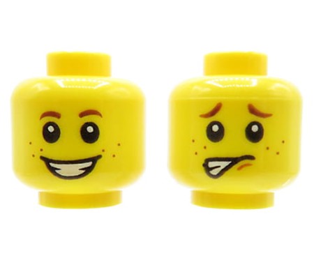 Głowa figurki LEGO w kolorze żółtym, dwustronna, dziecko, piegi, uśmiech / przestraszona mina.